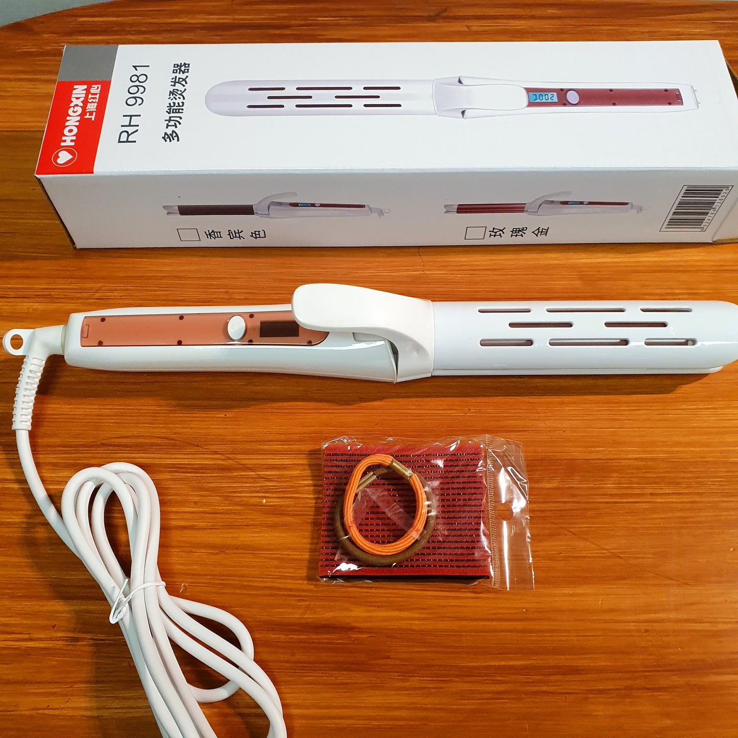 Hongxin digital curler rh 9981