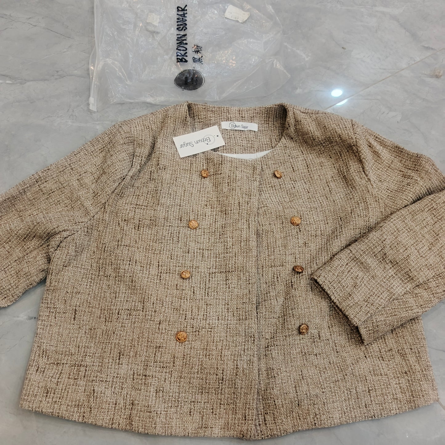 Brown suger branded ladies short coat medium to large size