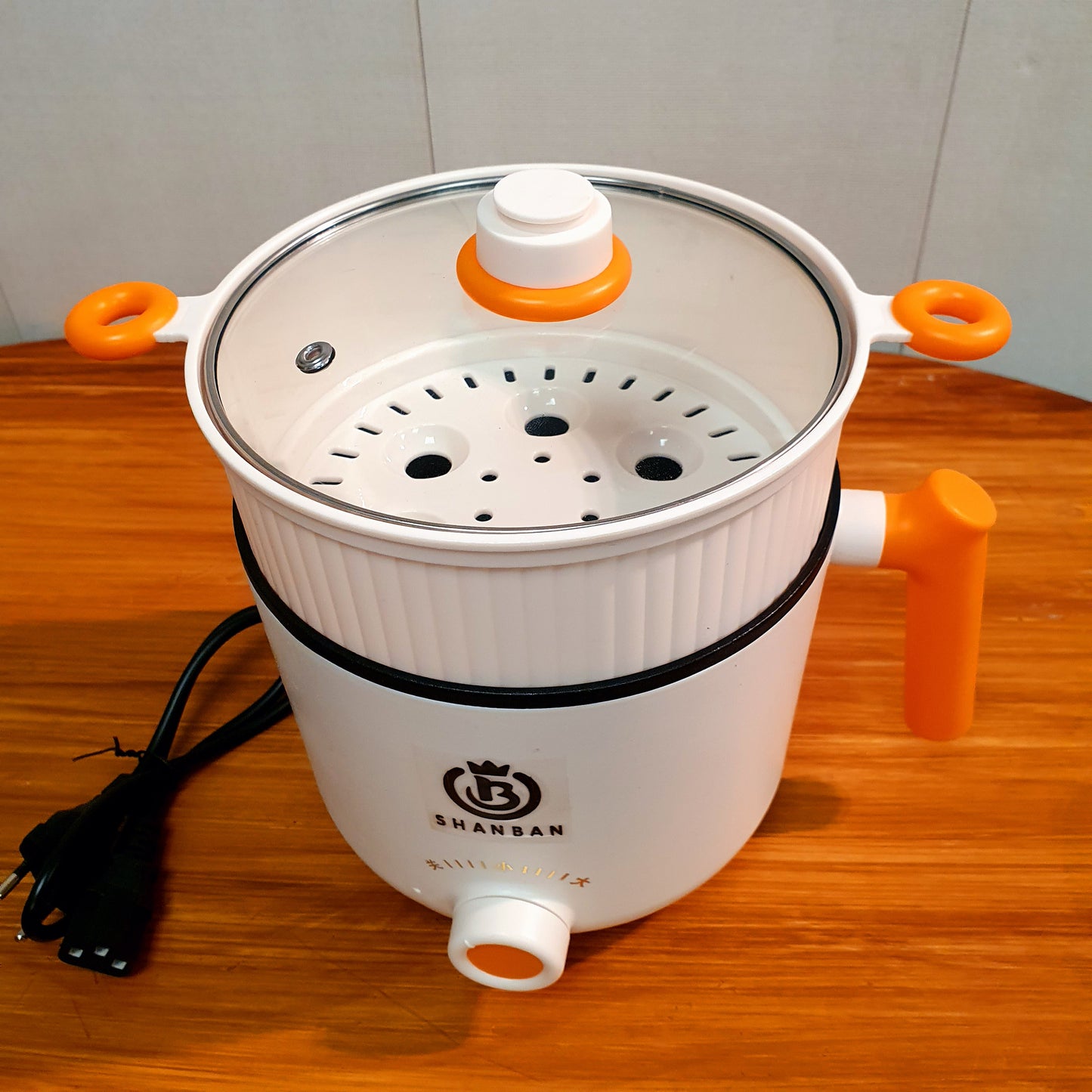 Electric cooker with steam option