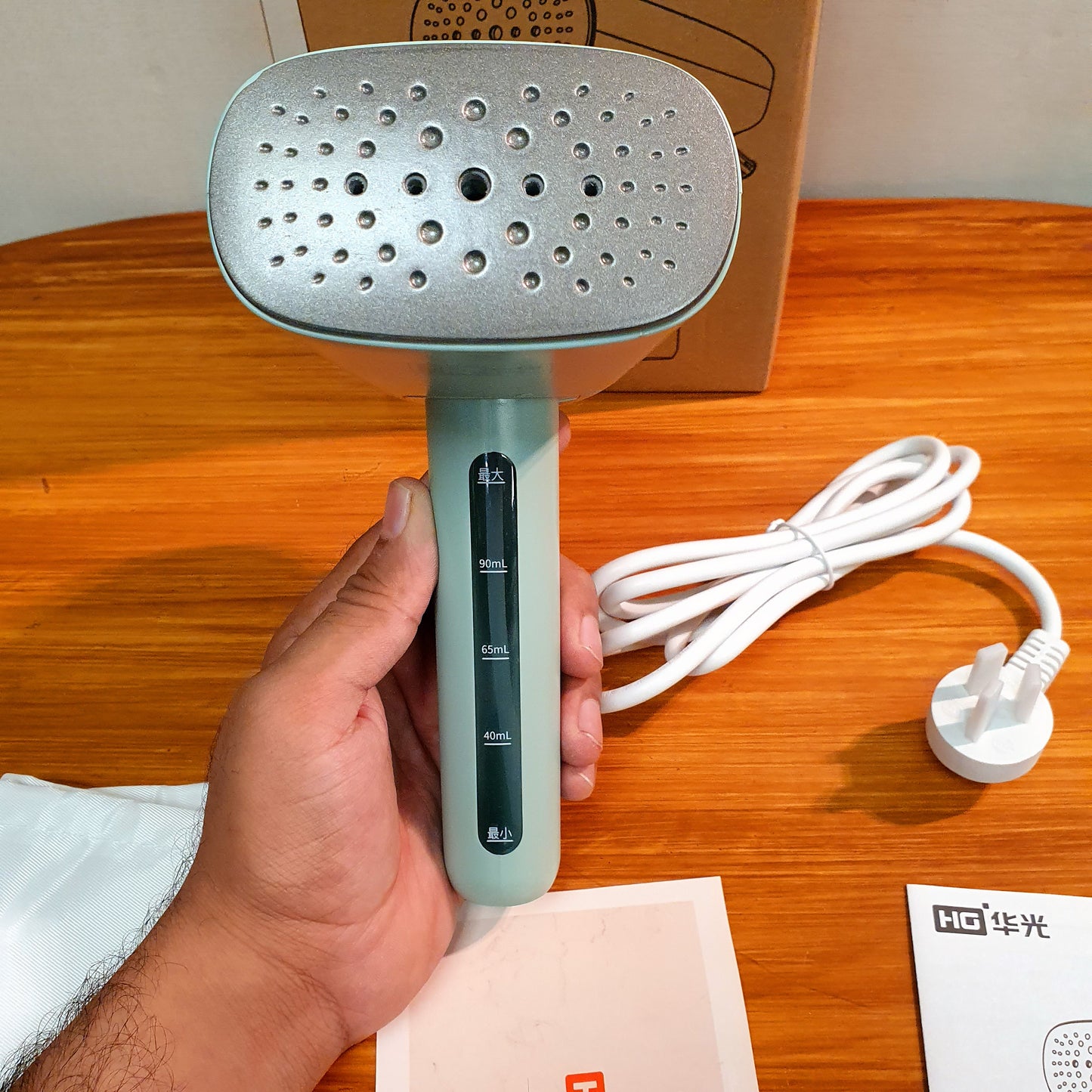 Handheld steamer iron