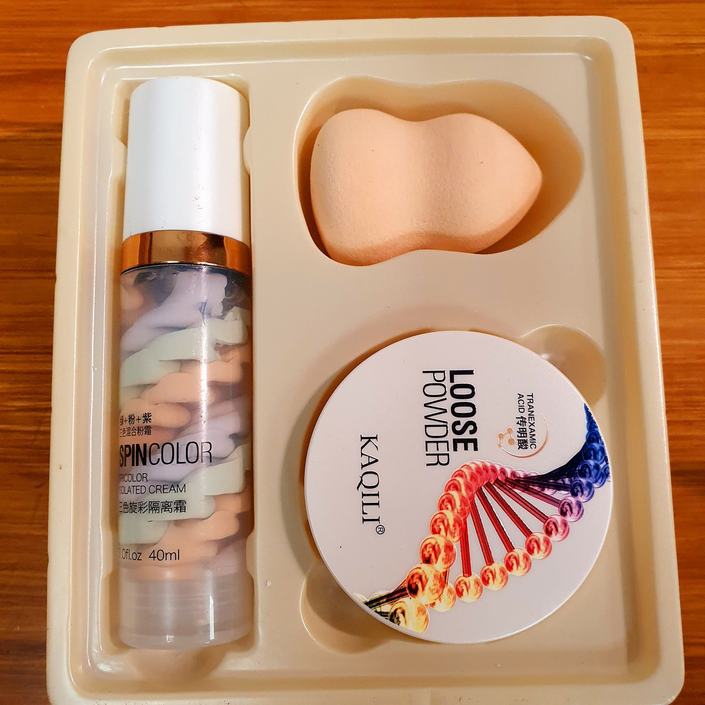 4 effect spin color isolated cream + powder and puff