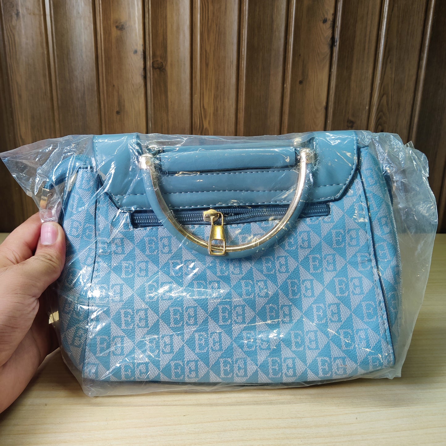 Chic Blue Geometric Pattern Handbag with Gold Handle