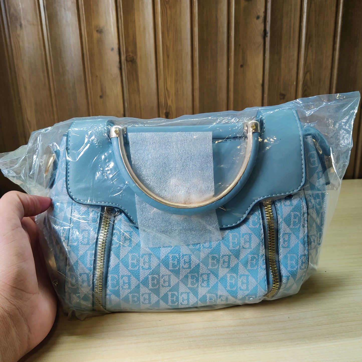 Chic Blue Geometric Pattern Handbag with Gold Handle