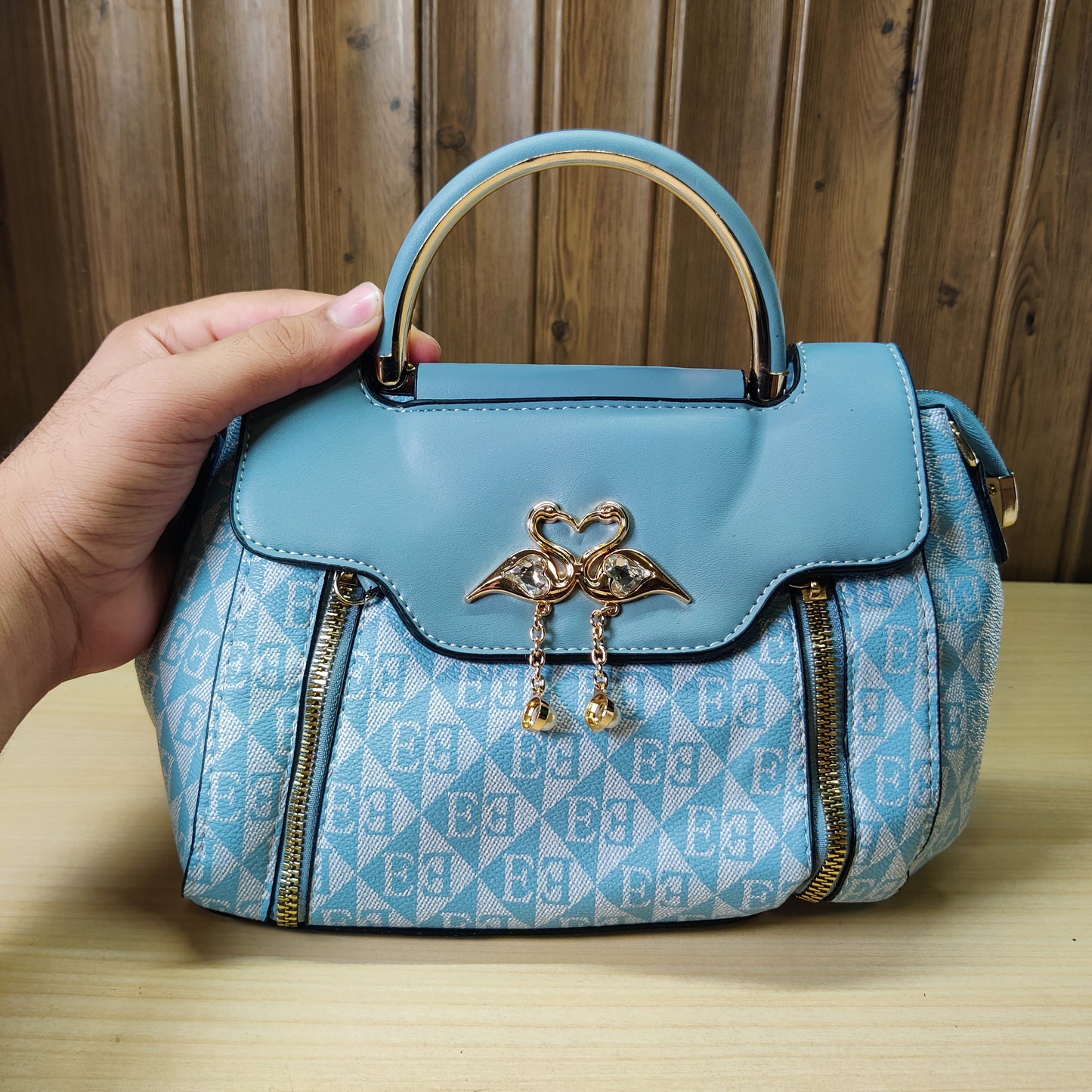 Chic Blue Geometric Pattern Handbag with Gold Handle