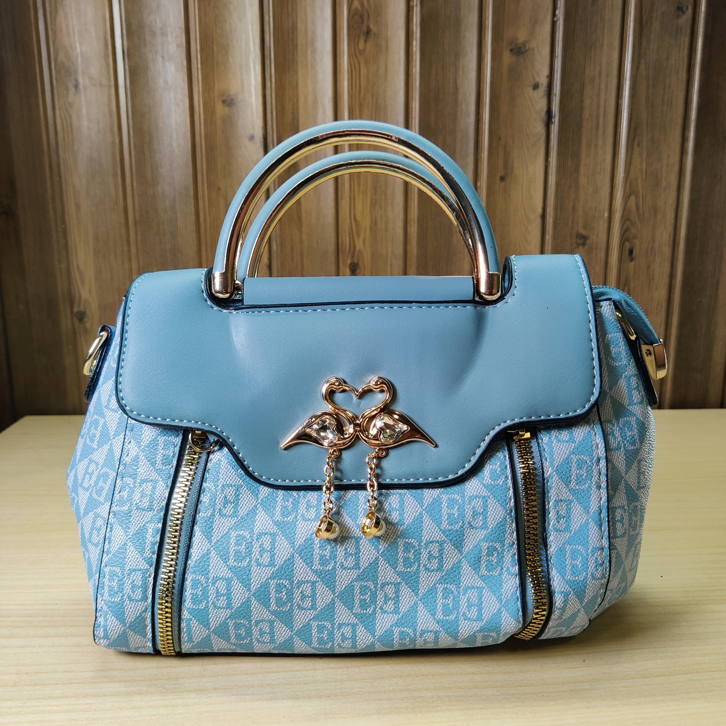 Chic Blue Geometric Pattern Handbag with Gold Handle