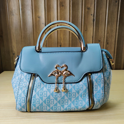 Chic Blue Geometric Pattern Handbag with Gold Handle