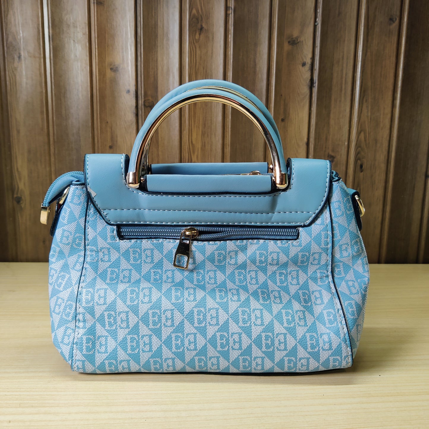 Chic Blue Geometric Pattern Handbag with Gold Handle