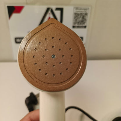 Portable handheld garment Iron