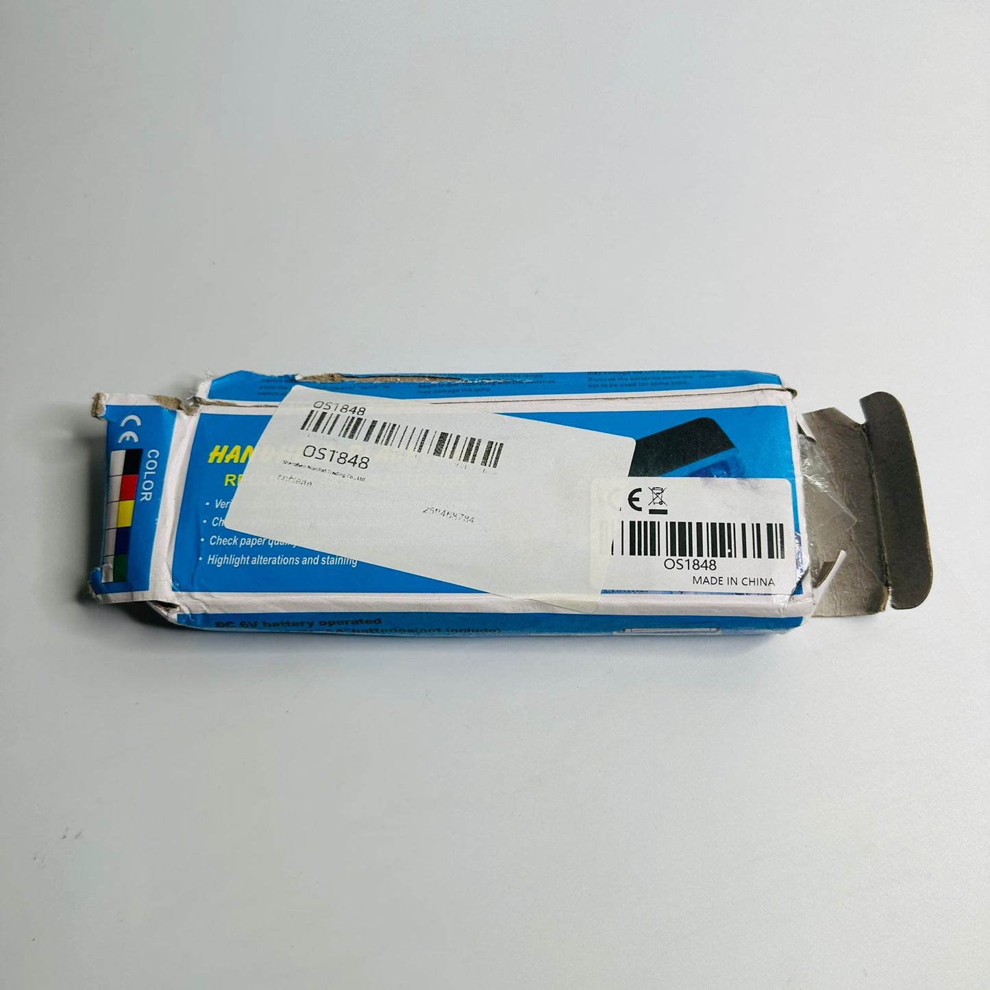 Hand-held money decector