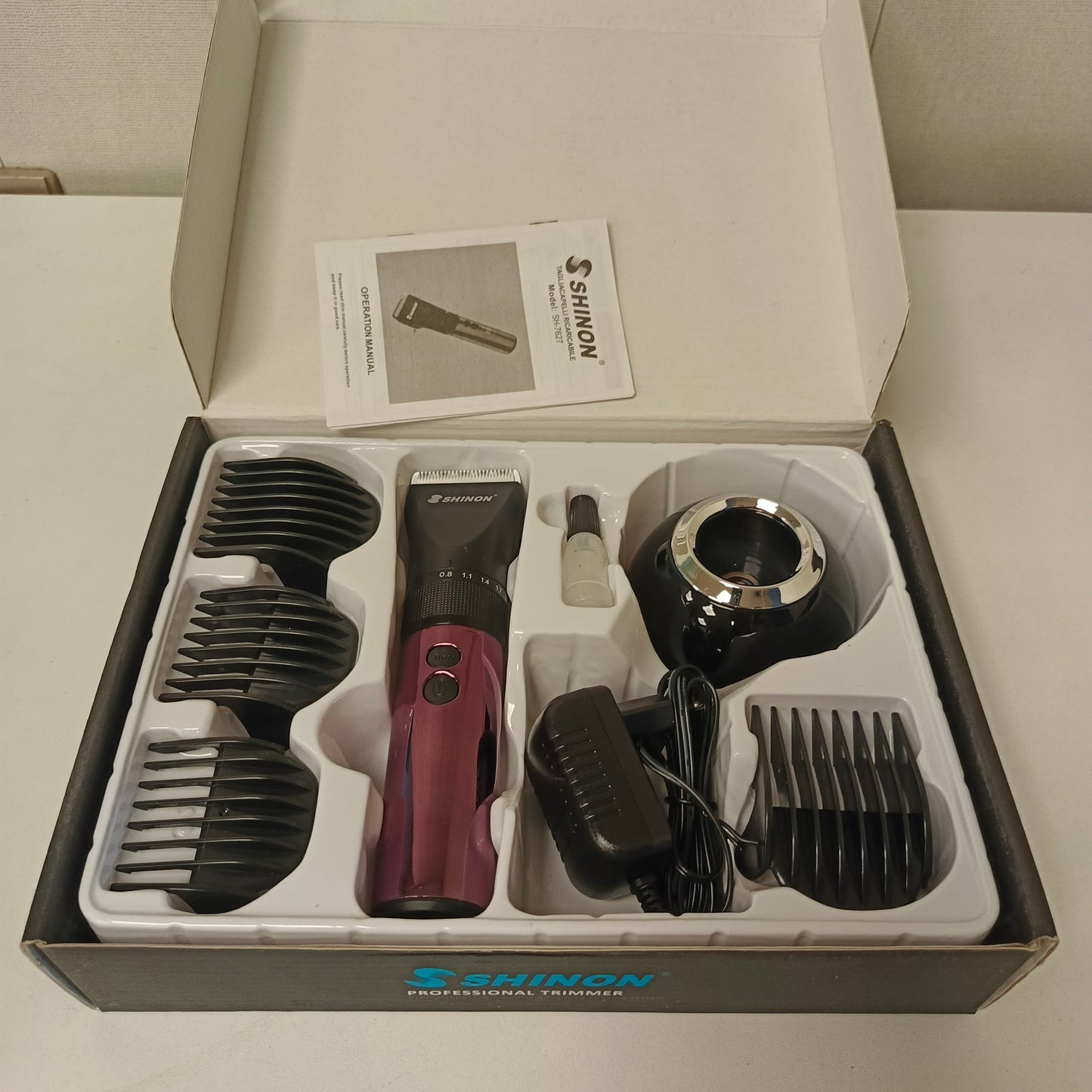 Professional High Quality Rechargeable Trimmer with Charging Dock and Multiple Combs