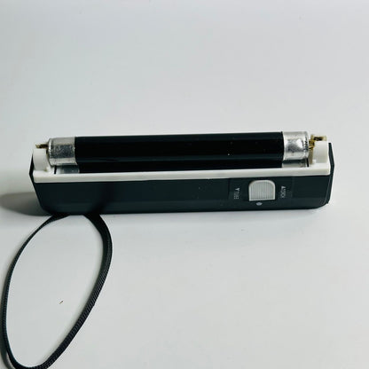 Hand-held money decector