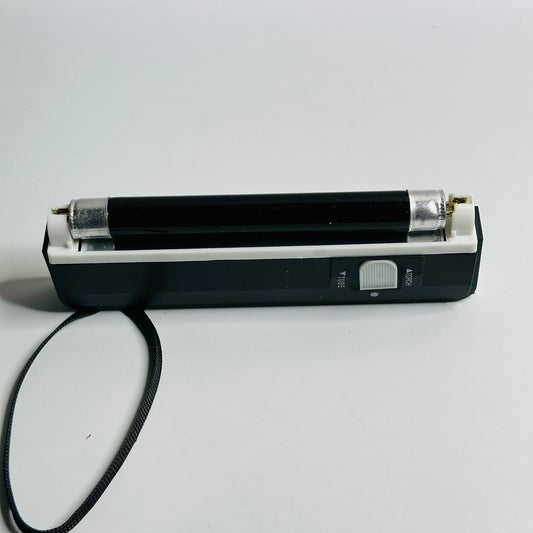 Hand-held money decector